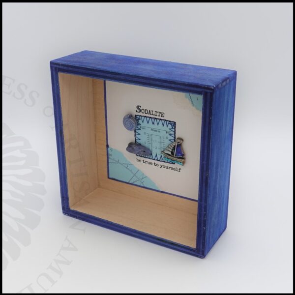 image of small wooden box frame with sodalite