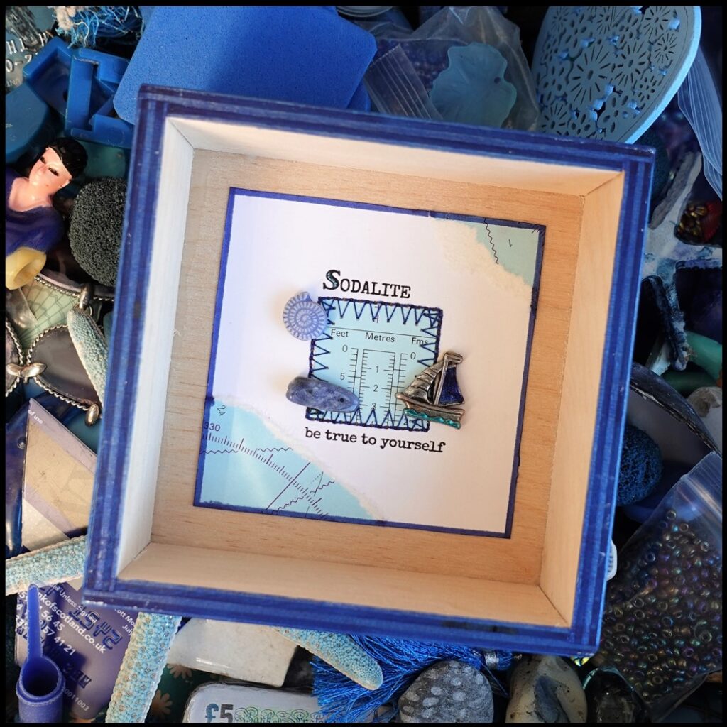 image of wooden box frame with sodalite