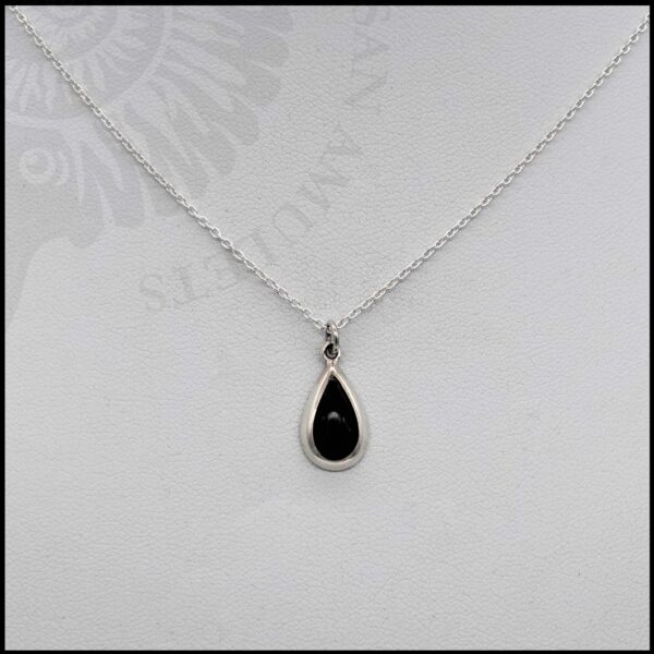 image of tiny whitby jet pendant on chain