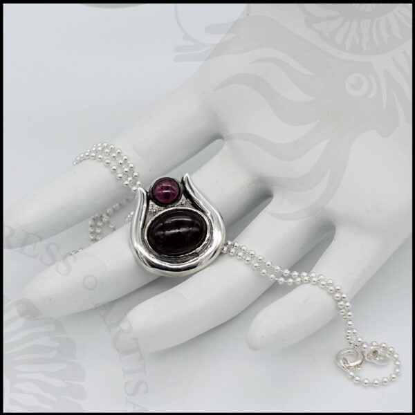 sterling silver necklace with round and oval garnet cabochons